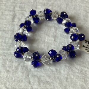 Triveni: Clear/Blue plastic bead bracelet- stretch